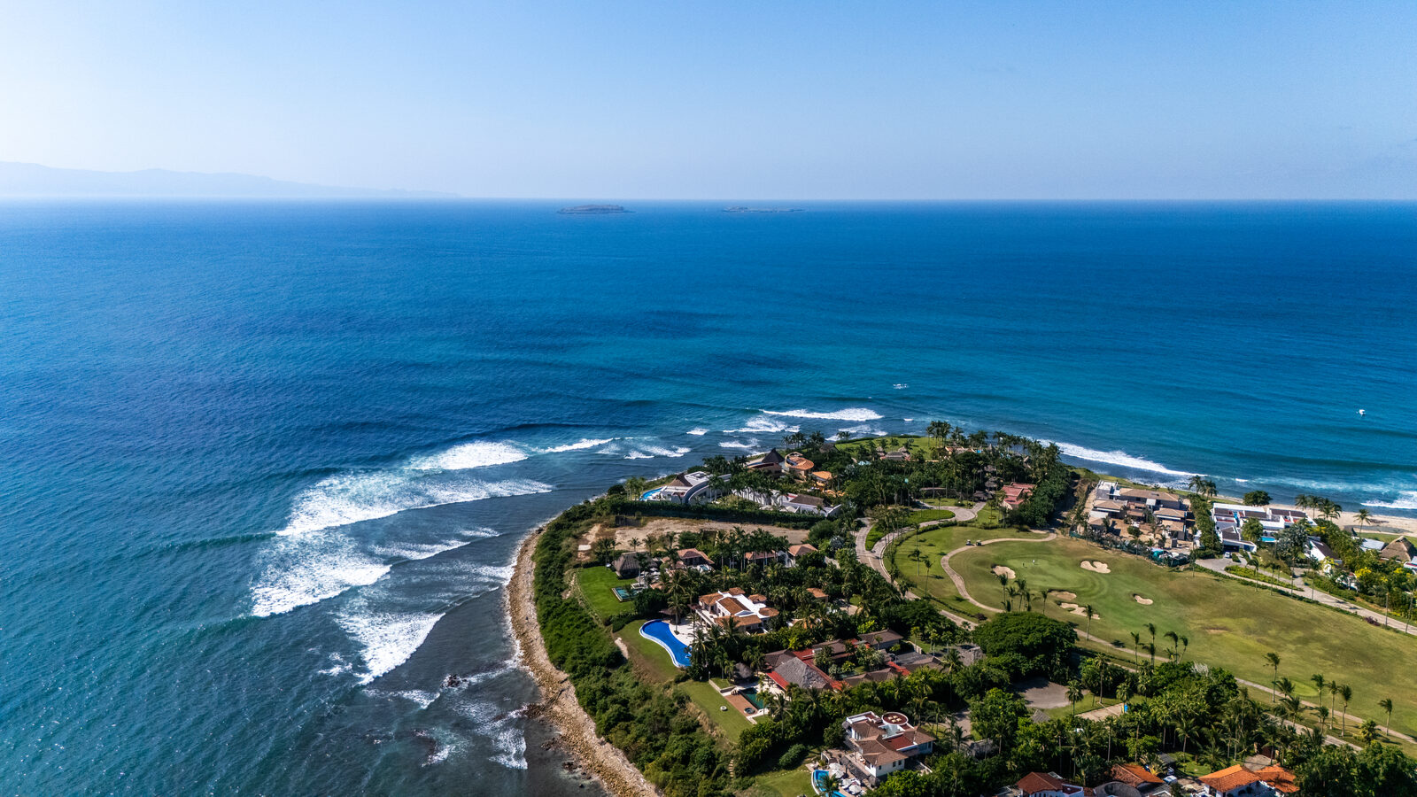 Villas at dusk overlooking the lagoon in La Punta Estates, Punta Mita