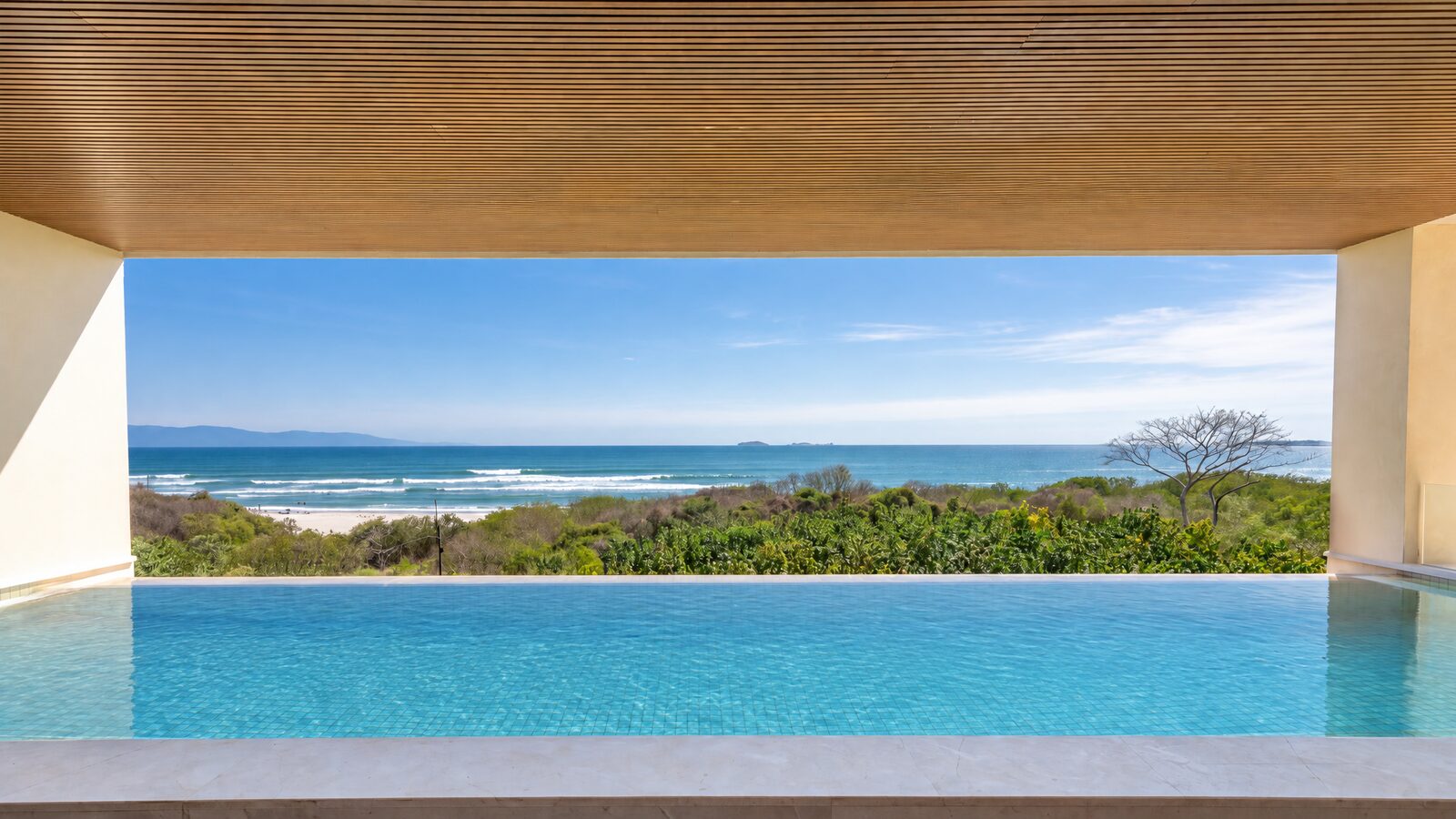Infinity pool overlooking the surf beach at Surf Residences, Punta Mita