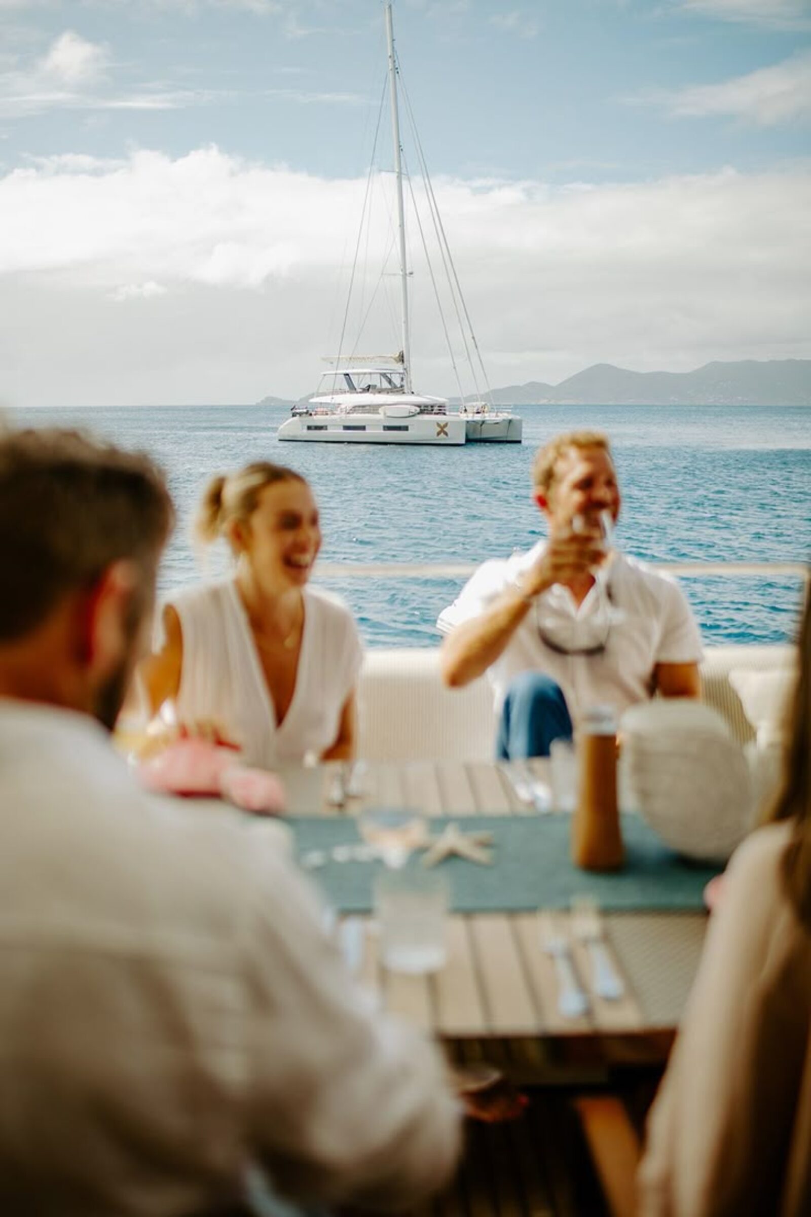 Friends toasting oceanfront in Punta Mita